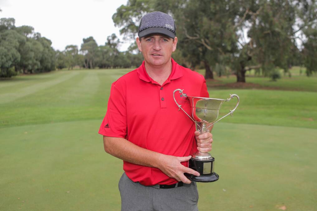 BACK-TO-BACK: Phil Beasley poses with the A-grade club champion trophy, after his securing his seventh title. Picture: Morgan Hancock