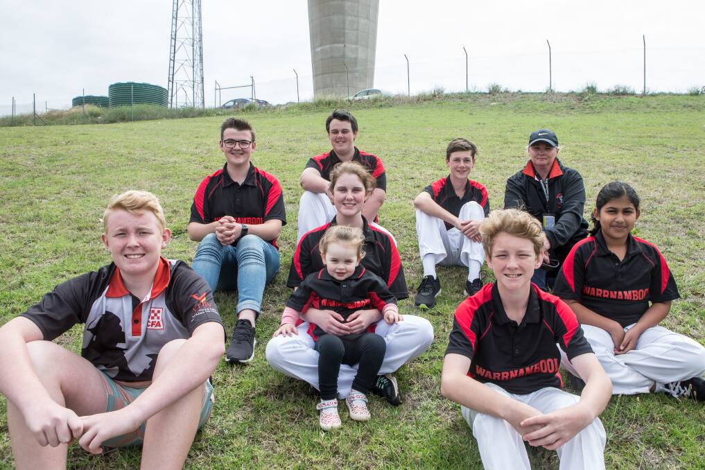 Relaxing: The Warrnambool Fire Brigade running team takes a break after competiting in this year's CFA Junior State Championships. Picture: Christine Ansorge