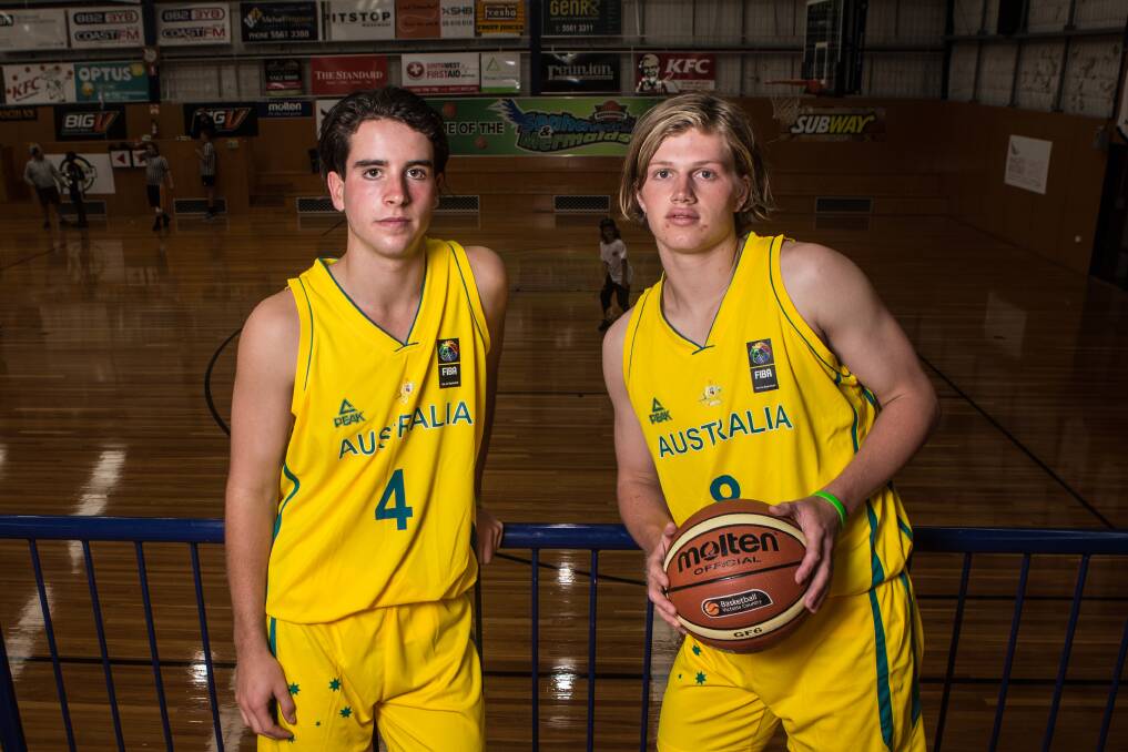 HOME-TOWN PRIDE: Liam Herbert and Jay Rantall in their first Australian green and gold uniforms at the Warrnambool stadium where they honed their basketball skills. Picture: Christine Ansorge