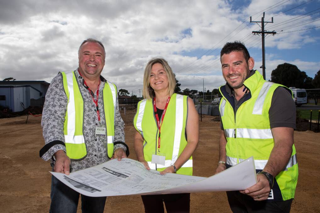 New home: Sandro and Susan Schietroma with site manager Michael Sgro at the former St John's Primary School site where they are building the new Kardinia Church in Dennington. Picture: Christine Ansorge