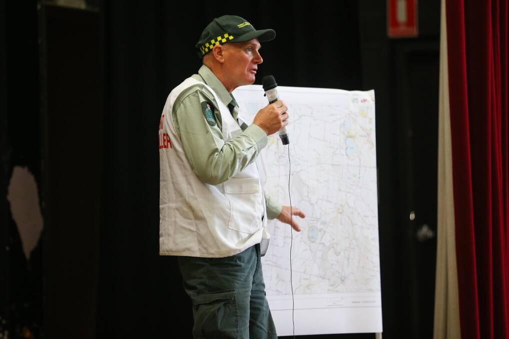 POSITIVE OUTLOOK: Terang fire incident controller addresses a public meeting at Cobden on Wednesday. Picture: Morgan Hancock