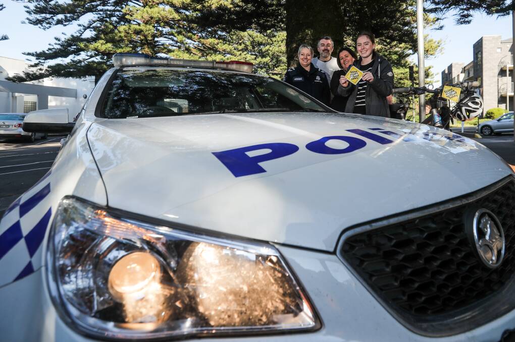Safety message: Warrnambool Police's Trudy Moreland, Road Trauma Support Service's Rhys Tate, Warrnambool City Council's Nicole Wood and Tess Dempsey urge people to turn their lights on this Friday for Shine a Light on Road Safety day. Picture: Morgan Hancock