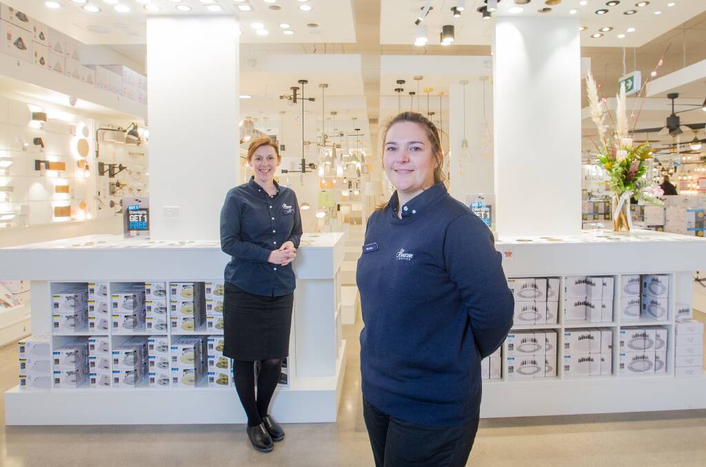 Leading the way: Beacon Lighting assistant manager Amanda Lowen and store manager Mel Jackson prepare for Saturday's grand opening.  Picture: Christine Ansorge