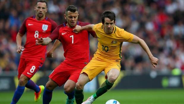 Big performance: Robbie Kruse was one of the best for the Socceroos in their 2-1 loss to England. Photo: Alex Livesey