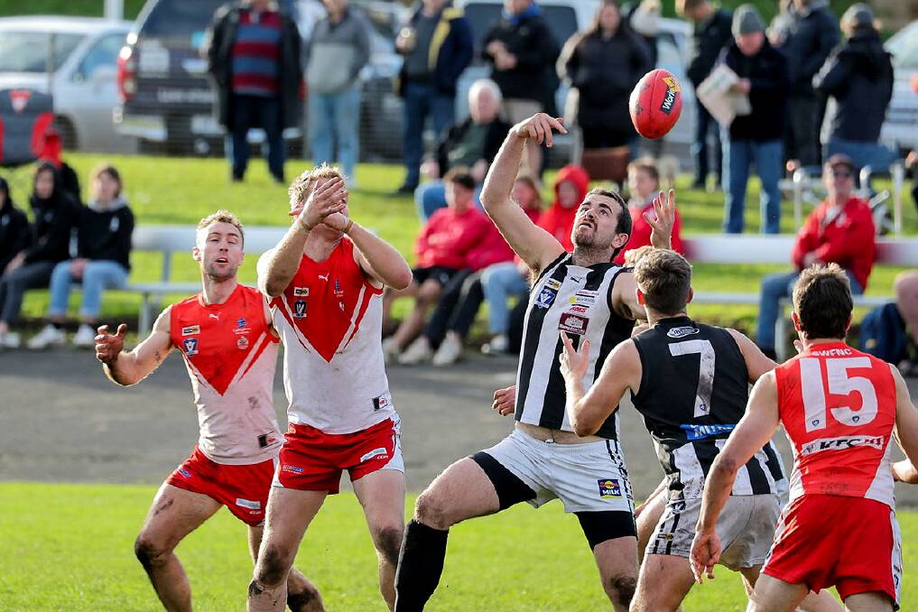 Camperdown ruckman Will Rowbottom keeps his eyes on the ball against South Warrnambool in 2023. Picture by Anthony Brady 