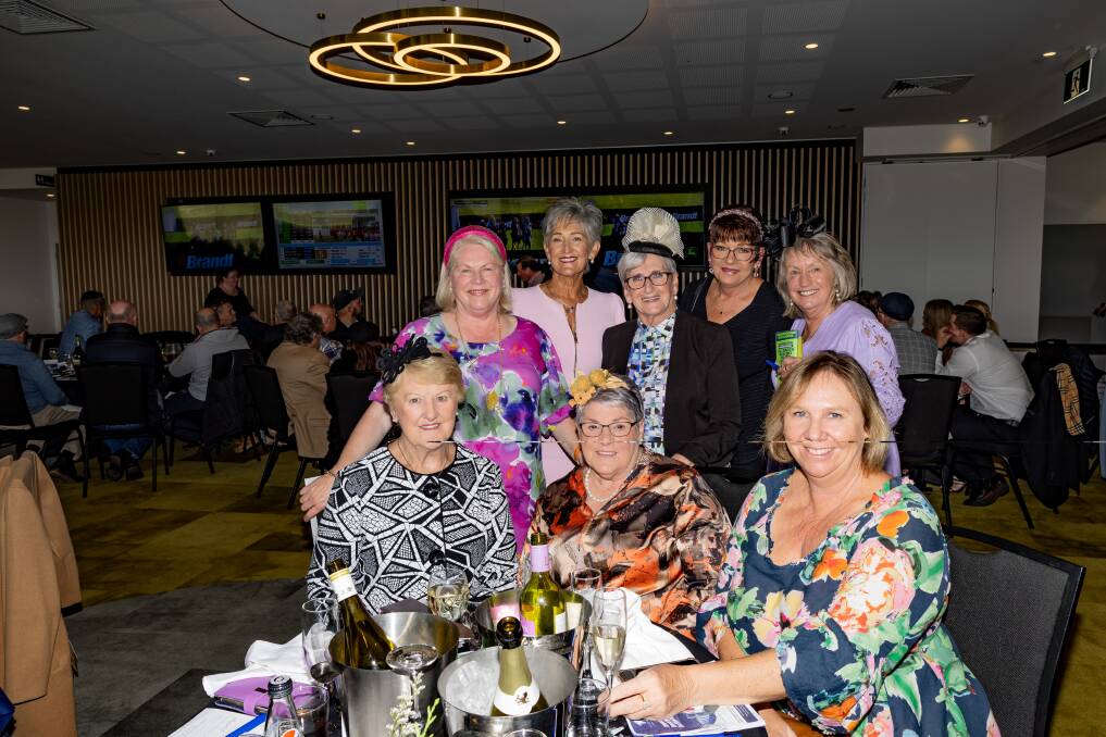 Maureen O'Donohue, Meryl Lenehan, Ines Rains, Cynthia Ryan, Sue Boyd, Mary McIlroy, Felicity Barker and Frances Dalton catch up at the May races on Wednesday, May 1. Picture by Anthony Brady 