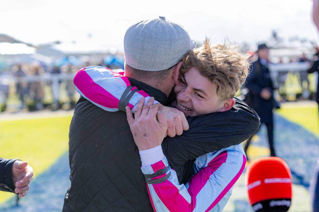 Declan Maher and Luca Remondet embrace after Chains of Honour won the Galleywood Hurdle. Picture by Eddie Guerrero 