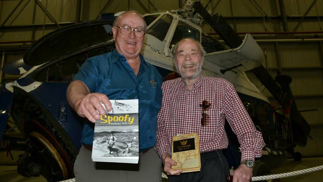 Tony Holt and Gordon Edgecombe share tales during their reunion at the Fleet Air Arm Museum which included lots of talk of Spoofy the black Labrador.