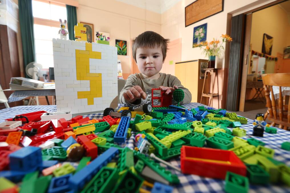 PLAY TIME: Jesse Walker, 3, of Warrnambool has some fun with Lego ahead of the Warrnambool Brick Club gathering this weekend. Picture: Vicky Hughson