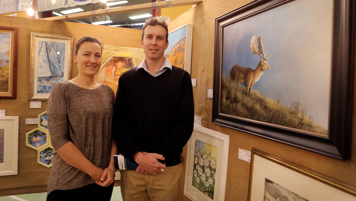 Natalie Ritchie and William Ritchie, of Gisborne, at the 2014 City of Warrnambool Art Show. 