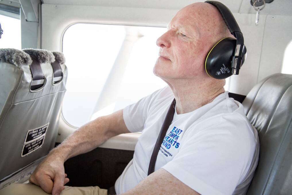 Remote access: Dr Noel Bayley flying to a remote part of East Timor to help those with preventable heart disease. Picture: Mat Lynn/East Timor Hearts Fund
