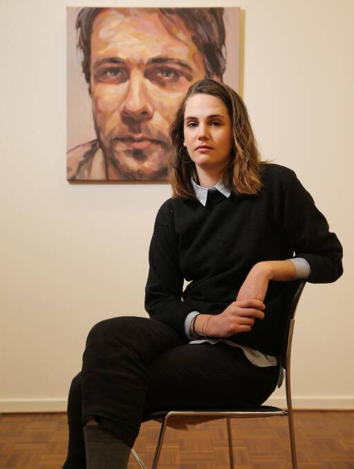 Portrait prize: Warrnibald portrait prizewinner Madeleine Peters with her painting of journalist Matt Neal. Picture: Rob Gunstone