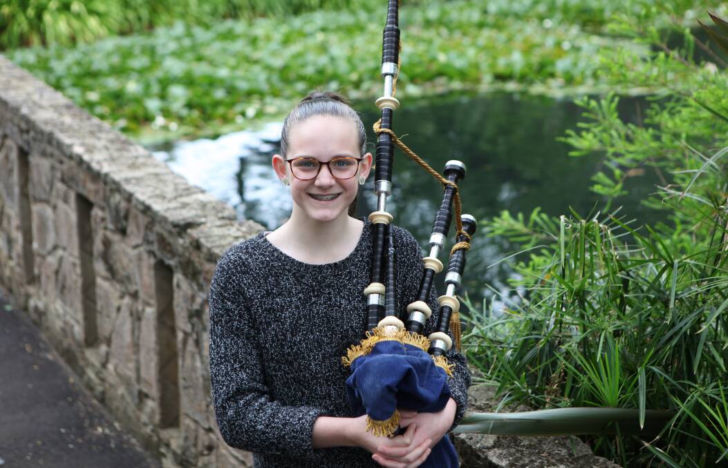 Healing power: Playing the bagpipes has had a healing effect on Stacey Riches' lung condition. She has been practising with Warrnambool's pipes and drums band in the botanic gardens to prepare for Saturday's competition.