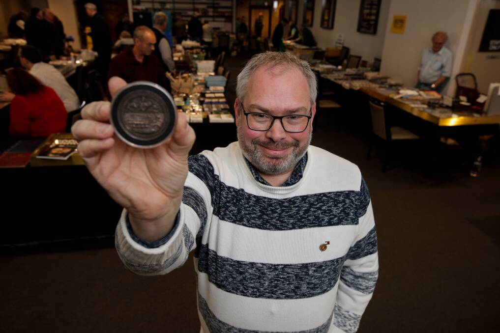 Rare find: Numismatic Association of Victoria president Darren Burgess with the $15,000 silver medal presented to William King who helped rescue shipwreck survivors off Mount Gambier in 1859. Picture: Rob Gunstone