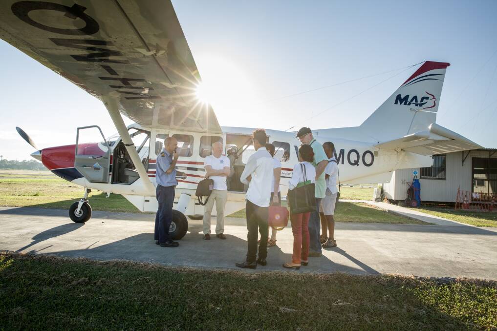 Flying visit: Warrnambool cardiologist Dr Noel Bayley and his team get ready to fly to a remote part of East Timor. They are raising $25,000 to continue their work. Picture: Mat Lynn
