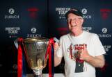 ALL SMILES: Lew Officer was rapt to get his hands on Melbourne's 2021 AFL premiership cup on Monday. Picture: Morgan Hancock
