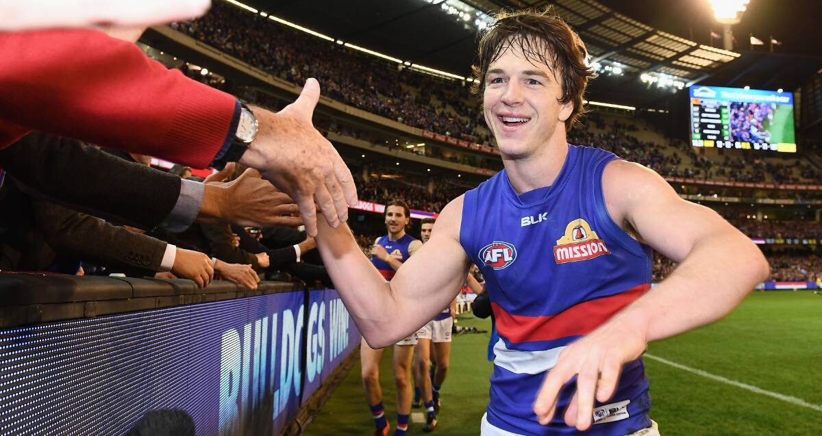 THAT GRINNING FEELING: Hamilton's Liam Picken is excited and relieved to be playing in the AFL grand final this weekend. Picture: Quinn Rooney/Getty Images