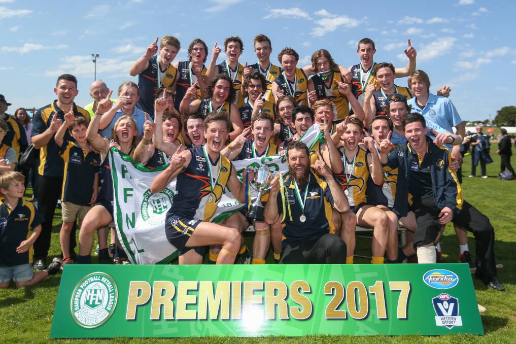 PARTY TIME: North Warrnambool Eagles' premiership team celebrates its win over Koroit. Pictures: Morgan Hancock