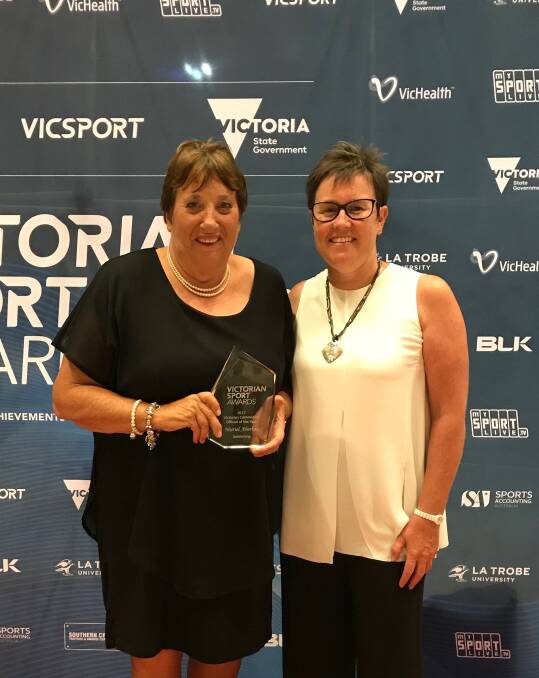 PROUD: Warrnambool's Muriel Aberline celebrates her Victorian Sports Awards community official of the year award with Swimming Victoria clubs and officials services manager Sharon Rich.