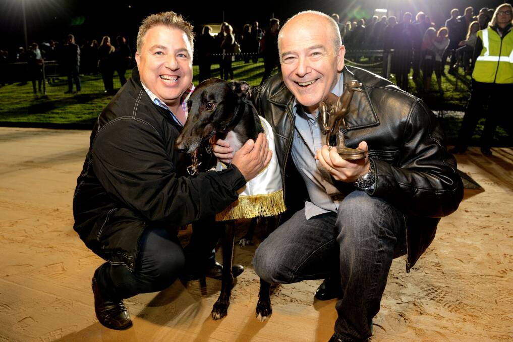 OVERJOYED: Sergio and Bill Buccilli, the owners of Bewildering, pictured with the Warrnambool Classic champion. Picture: Clint Anderson