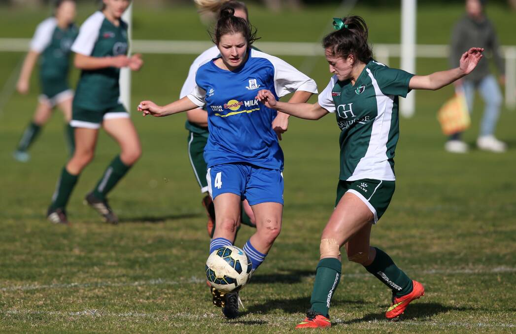PUSHING THROUGH: Warrnambool Rangers girls could edge closer to first place with a win on Sunday. Picture: Amy Paton