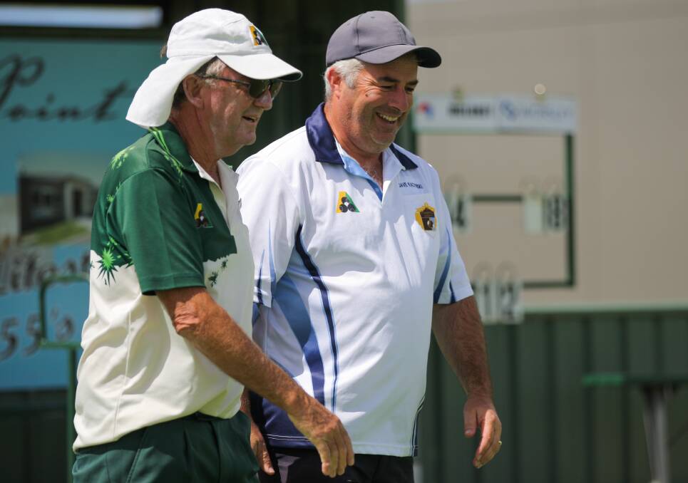 HAPPY DAYS: City Memorial's Colin Davey shares a laugh with Dave Kaczynski of Stawell during the Des Notley Pairs at Warrnambool's City Memorial Bowls Club.
