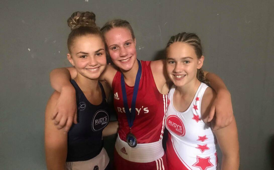 PROUD: Rudy's Boxing's Dakotah Keane, Amy Gibbs and Katie Willsher after their state title victories on the weekend. Picture: Supplied