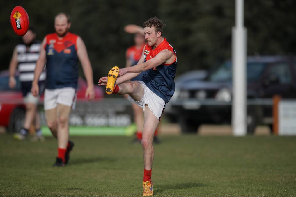 Timboon Demons player Steven Crees roosts the ball towards attack. Picture: Amy Paton
