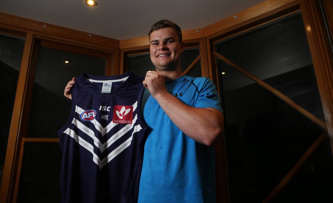 WAY TO GO: Cobden player Sean Darcy celebrates being drafted by Fremantle at pick 38 at his house in South Purrumbete. Picture: Amy Paton