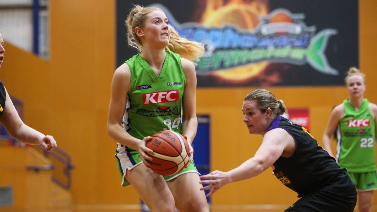 EYES UP: Warrnambool Mermaids' Lilly Killey looks towards the hoop. She finished with five rebounds. Picture: Morgan Hancock