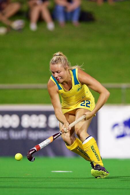 CLOSE CONTROL: Madi Ratcliffe playing for the Hockeyroos. Picture: Getty Images