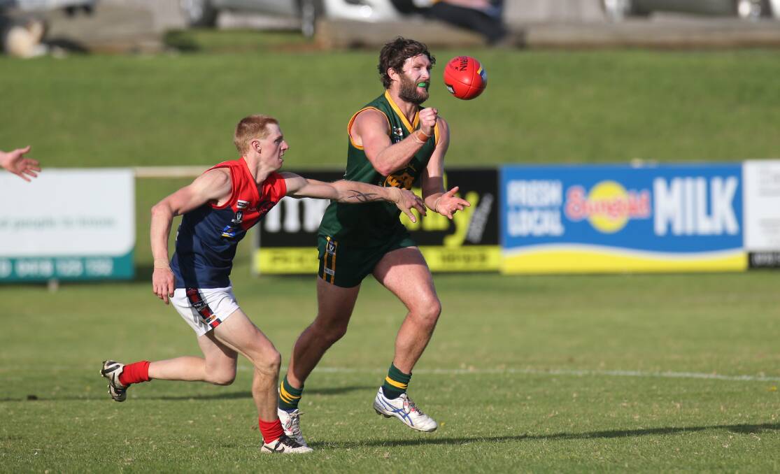 Timboon's Samuel Newey and Old Collegians' Scott Day. Picture: Vicky Hughson