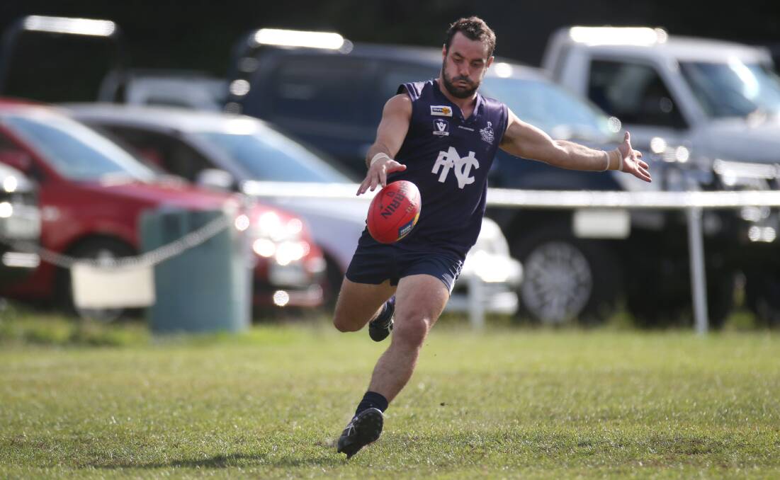 TRUE LEADER: Nirranda's Peter McDowall kicks along the boundary. He will return from a serious shoulder injury this week. Picture: Amy Paton