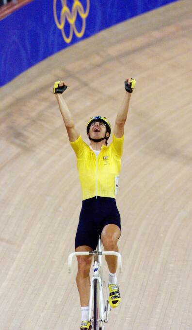 Scott McGrory enjoys the gold medal win in the Madison at the Sydney 2000 Olympics. Picture: Mal Fairclough 