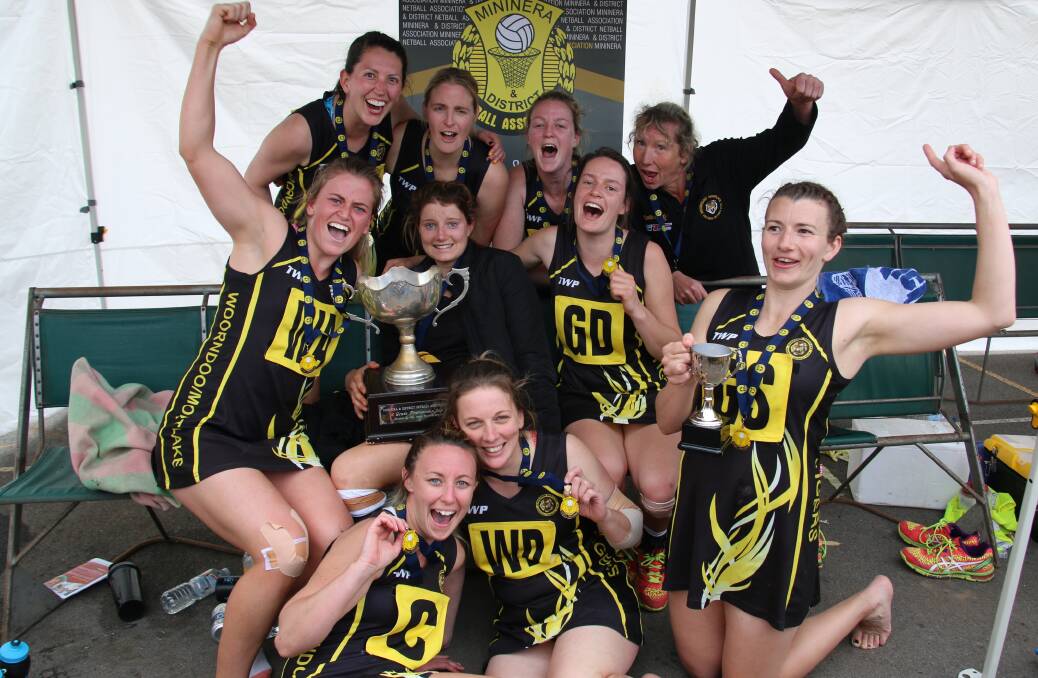 YELLOW AND BLACK: Woorndoo-Mortlake's A grade premiership team made history in defeating Glenthompson-Dunkeld. Pictures: Tracey Kruger