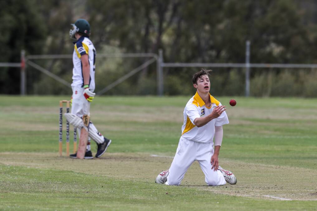 CLASSIC CATCH: Jackson Couch throws the ball to the umpire after taking a catch to remove Horsham-West Wimmera batter Jordyn Delahunty.