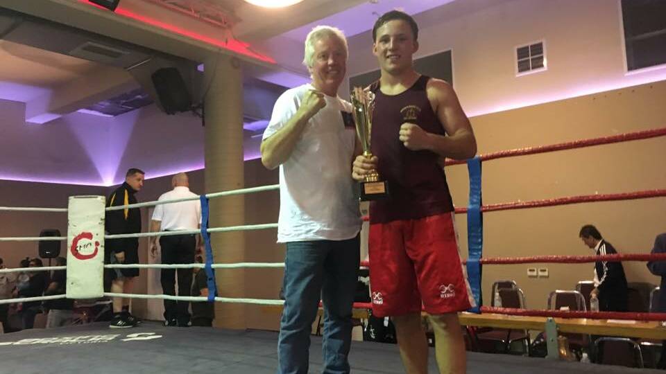 Hitting hard: Coleraine duo Ray 'Mocka' McIntosh and Donald Jones stand proud after claiming the Victorian light heavyweight title on Sunday at Brunswick's Reggio Calabria Club.
