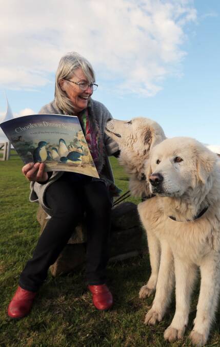 A book for young and old: Author Diane Jackson Hill with her book and some Maremma guard dogs. Picture: Rob Gunstone.