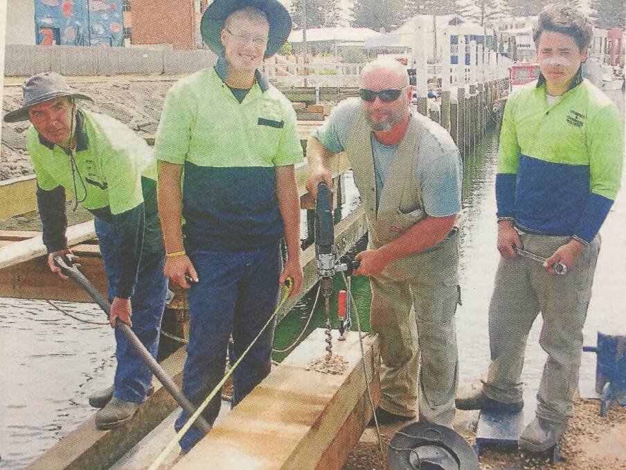 Wharf woes: Workers were completing the final stages of rebuilding the western wharf on the Moyne River. Pictured here Terry Lynch, Cameron Brown, Jason Willett and Corey Brown.