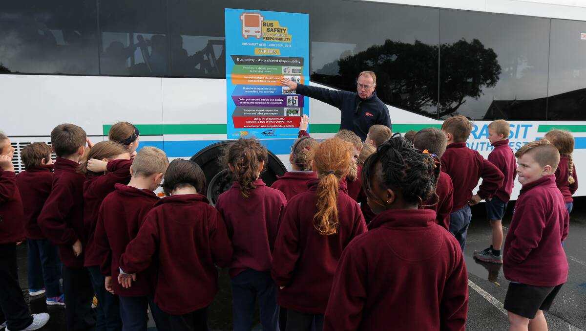 Keeping kids safe: Foundation to Grade two students from Warrnambool East Primary School learn about Bus Safety from Transport Safety Victoria and the Bus Association of Victoria. Picture: Rob Gunstone