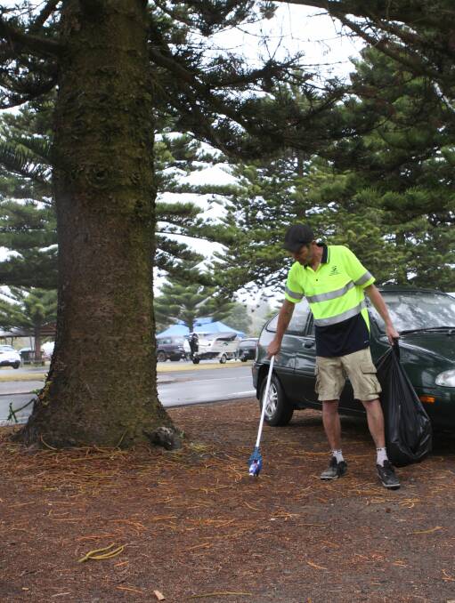 Squeaky clean: Warrnambool City Council cleaner Luke Kelly praised New Year's revellers for their relatively clean behaviour following Sunday night's beach-side celebrations. Picture: Rebecca Riddle