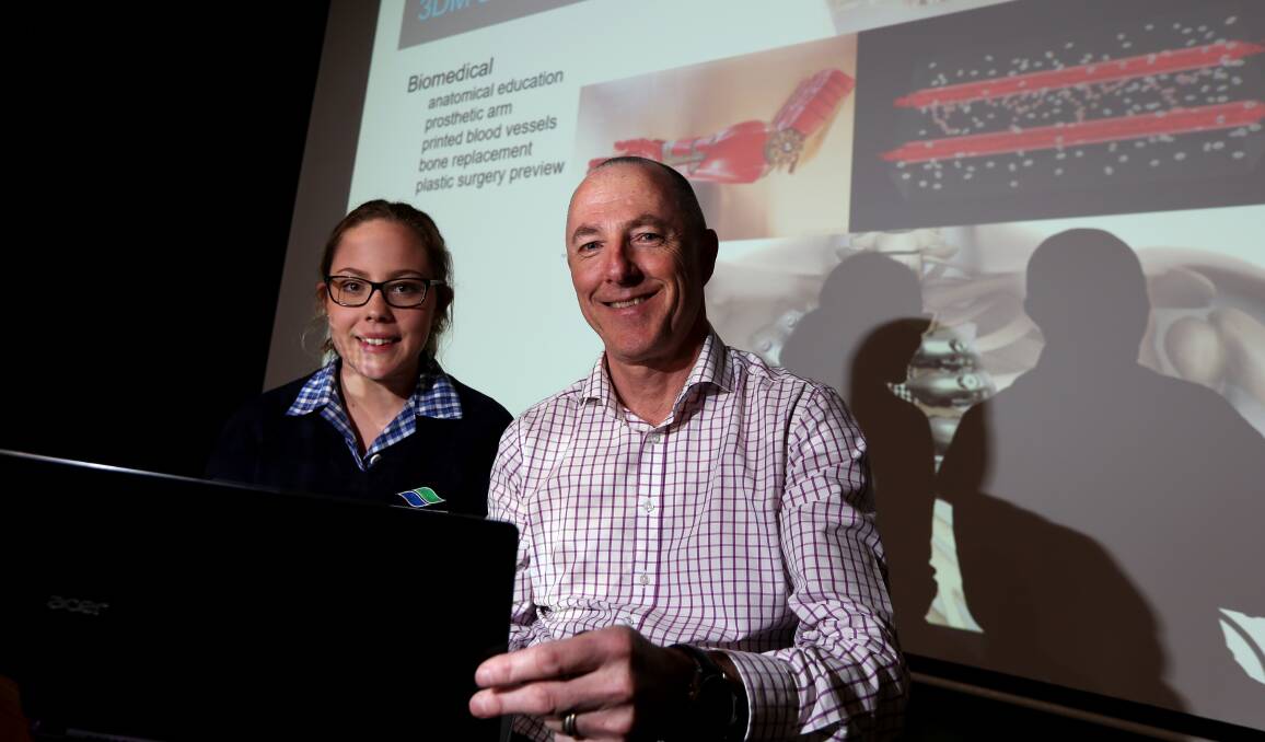 Future: Warrnambool College student Olivia Burns, 15, with Australian 3D Manufacturing Association CEO Mike de Souza. Picture: Rob Gunstone