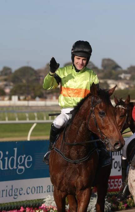 Champion: Steve Pateman returns to scale on one of the greatest jumpers Australia has seen, Bashboy, after winning the Thackeray Steeplechase at Warrnambool last year.