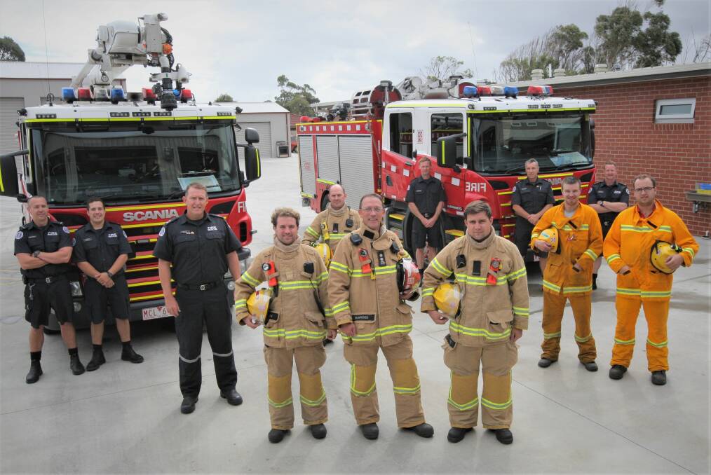 Saviours: A crew of Warrnambool firefighters helped save up to a dozen homes in Terang during Saturday night's fast-moving fires. Picture: Anthony Brady