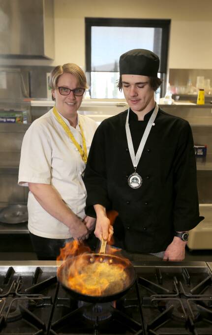 Fired up: Last year's winner Rebecca Harris and runner up Justin Carroll are set to step up in the 2016 Apprentice Chef Challenge. Picture: Rob Gunstone