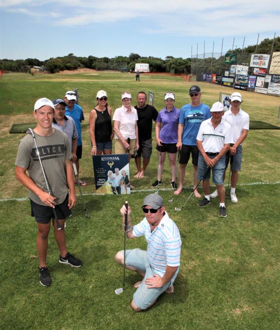 HOLIDAY SWING: Brisbane Lions player Hugh McCluggage (left) and the south-west region club champions had a go at the hole in one competition. Picture: Nick Ansell