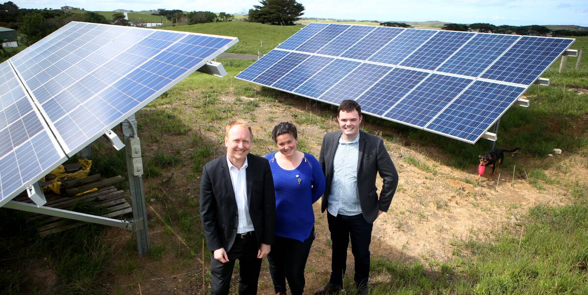 Power of the sun: State Greens leader Greg Barber, Dennington resident Zoe Damman and Greens representative Thomas Campbell at a property that is run entirely using solar energy. Picture: Amy Paton