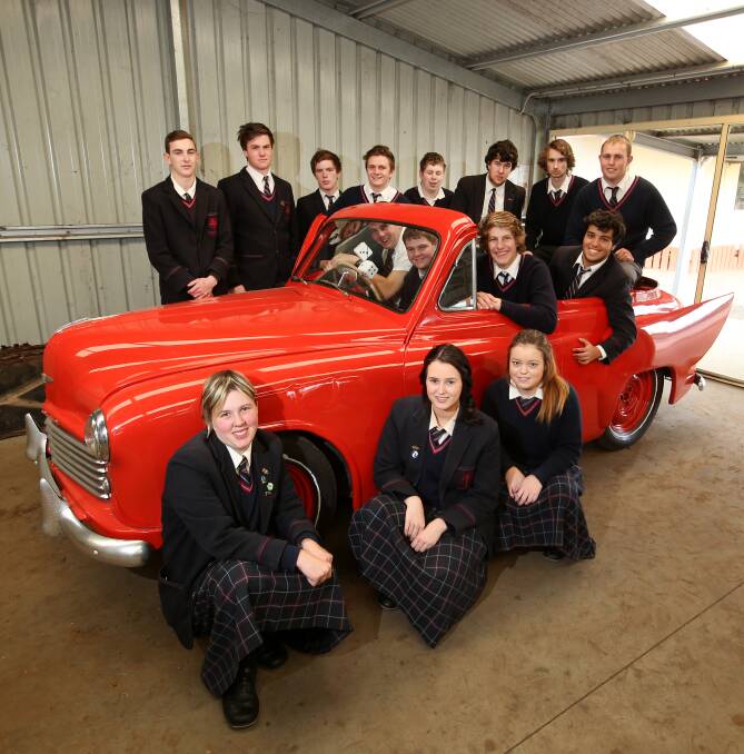 Dazzling transformation: Year 12 VCAL students from Emmanuel College have converted the car for the school's production of Grease with some help from a local business. Picture: Amy Paton