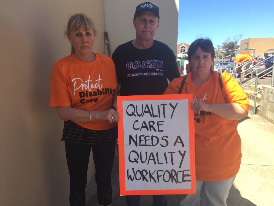 Disability support workers Bronwen Williams, Murray McLean and Sonia McDonald were part of a larger group that rallied in Warrnambool on Wednesday morning.