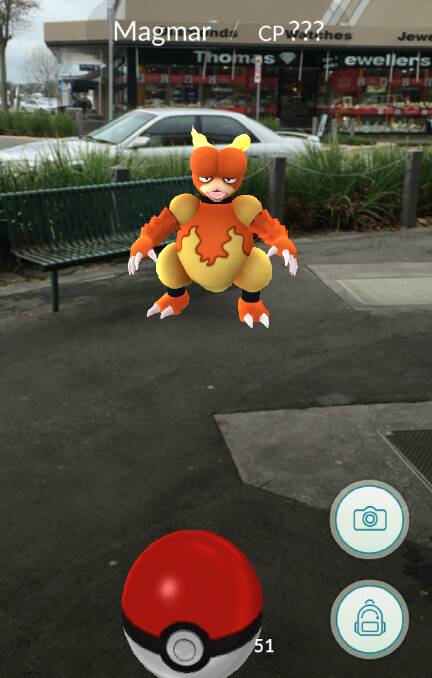 Gotta catch 'em all: A Magmar Pokemon appeared on the corner of Liebig and Lava Streets on Friday.